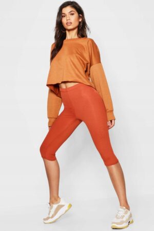 Z5B314 BOOHOO PRĄŻKOWANE LEGGINSY CROPPED 3/4 MIEDZIANE 38 M