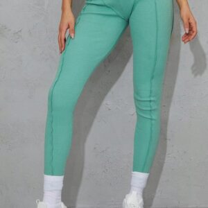 X5B204 PLT ZIELONE LEGGINSY PRĄŻKOWANE 38 M